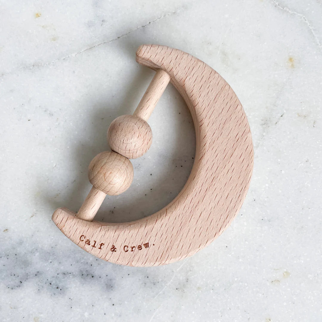 Calf and crew- wooden moon rattle